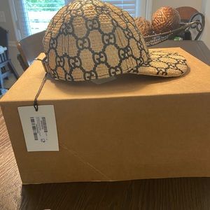 GUCCI
Elaphe Raffia Interlocking GG Baseball Hat